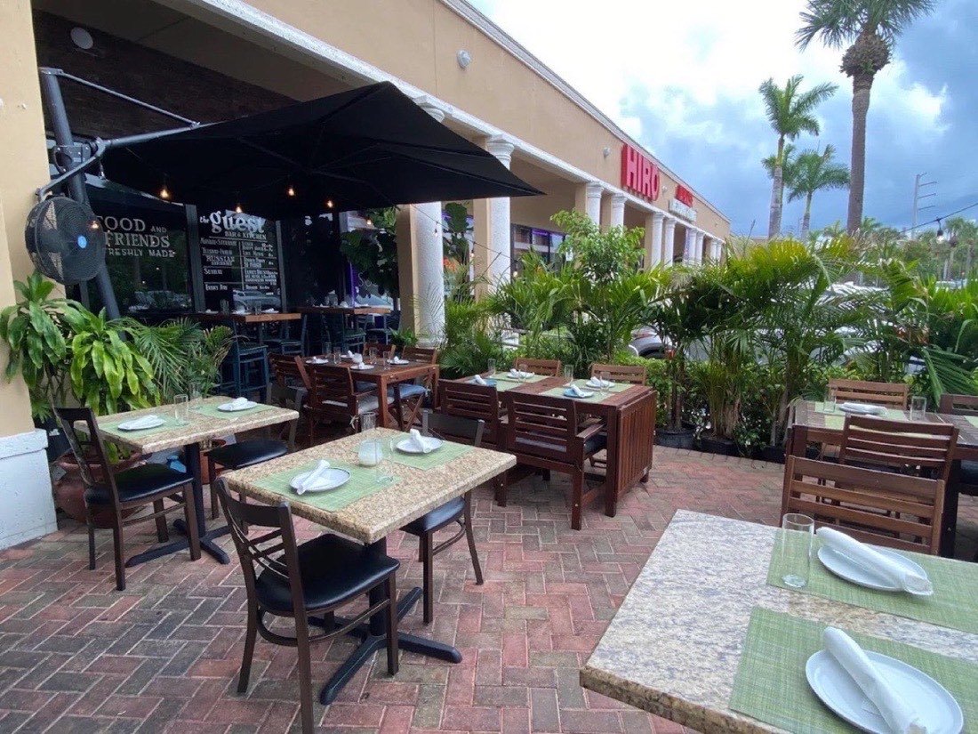 Outdoor patio seating at Grandma's Secret near Sunny Isles